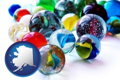 alaska map icon and glass marbles