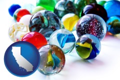 california map icon and glass marbles