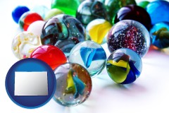 colorado map icon and glass marbles