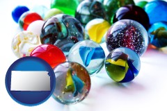 kansas map icon and glass marbles