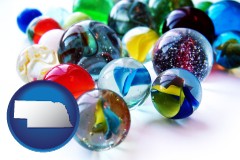 nebraska map icon and glass marbles