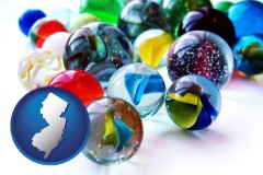 new-jersey map icon and glass marbles